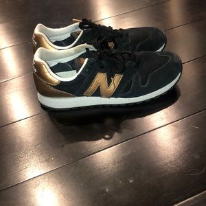 New balance black and gold 520’s